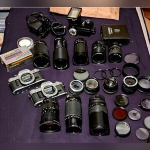 Two Canon cameras and lenses